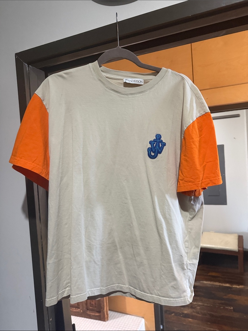 JW ANDERSON Cream Tee with Orange Sleeves and Blue Anchor Logo